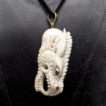 Carved Bone Dragon Head Pendant