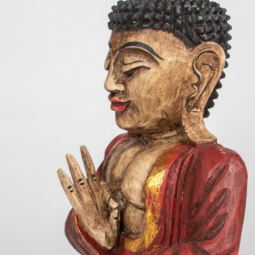 Rustic Carved Wooden Buddha in Colorful Robe