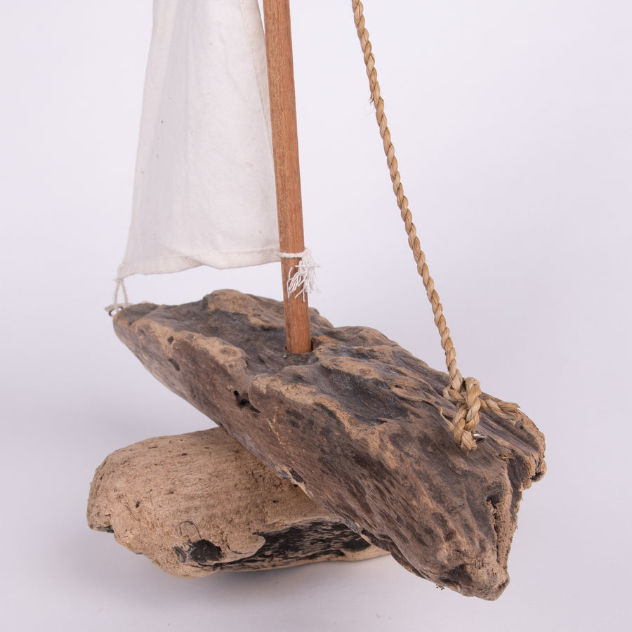Sailing By on a Driftwood Boat