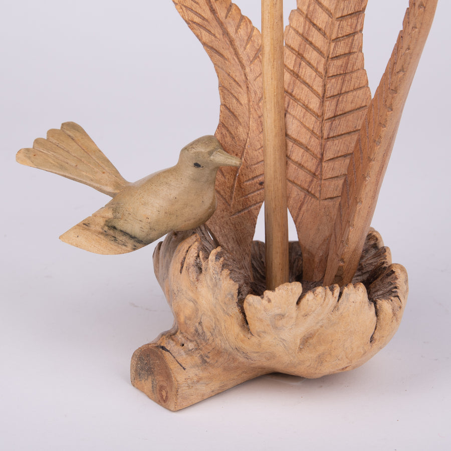 Parasite Carvings of Delicate Birds and Leaves