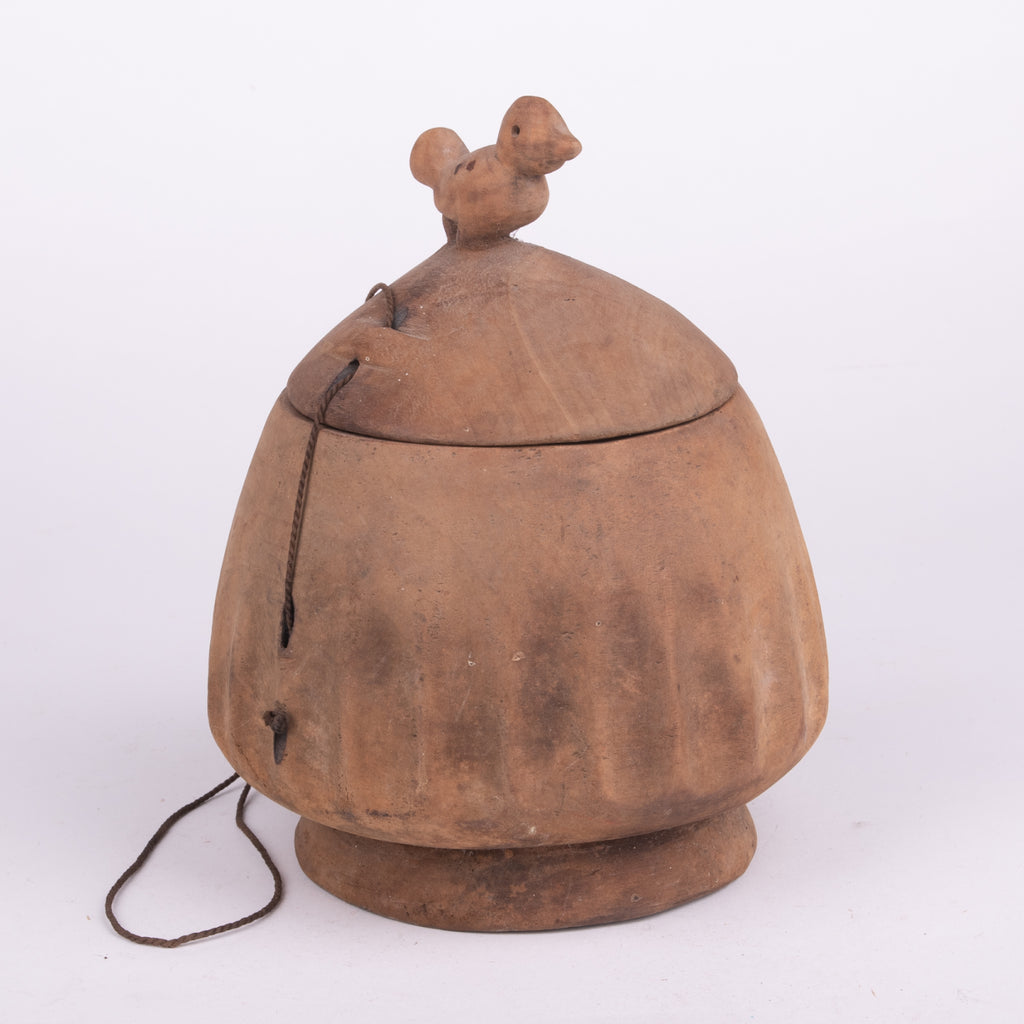 Old Wooden Vessel with Bird on Top